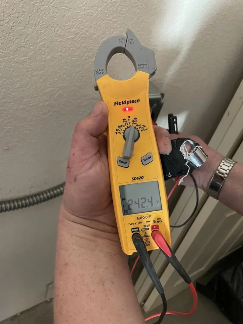 Voltage testing with clamp meter during Hot Tub / Pool Electrical Wiring in Mount Airy